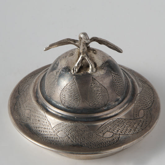 A perfume vessel with a dove of peace