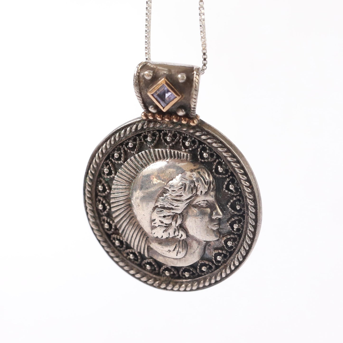 silver and touch of gold Roman coins pendant with amethyst stone