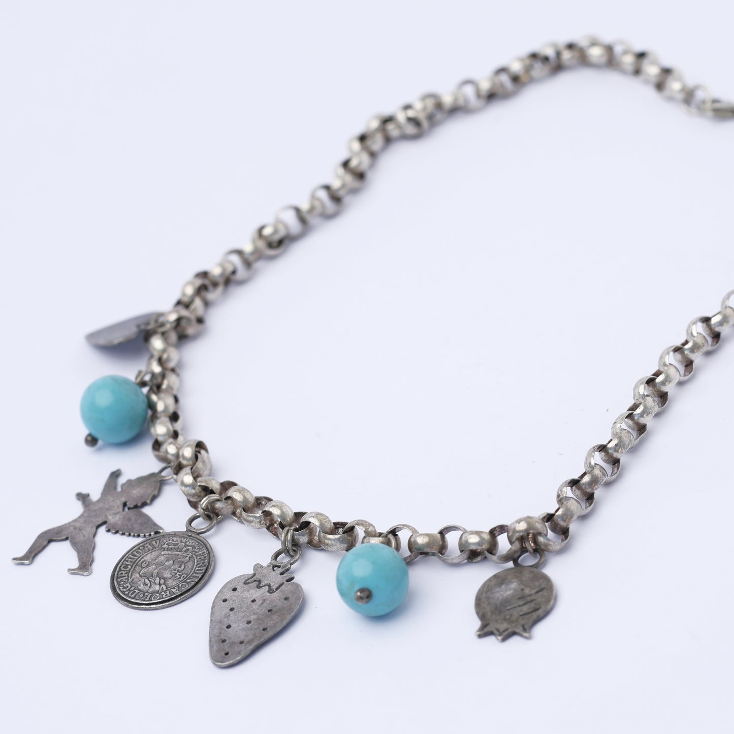 Vintage Silver Charm Necklace with Turquoise Accents