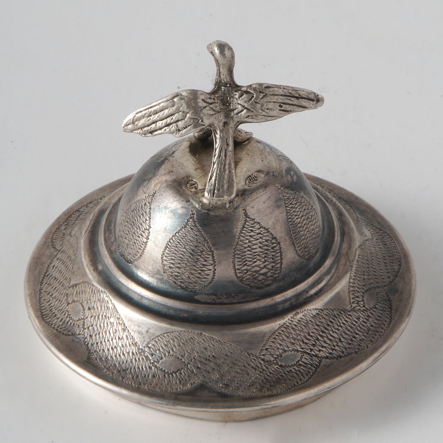 A perfume vessel with a dove of peace