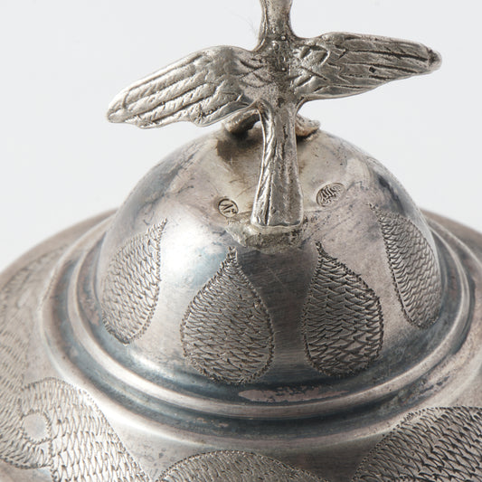 A perfume vessel with a dove of peace