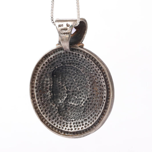 silver and touch of gold Roman coins pendant with amethyst stone