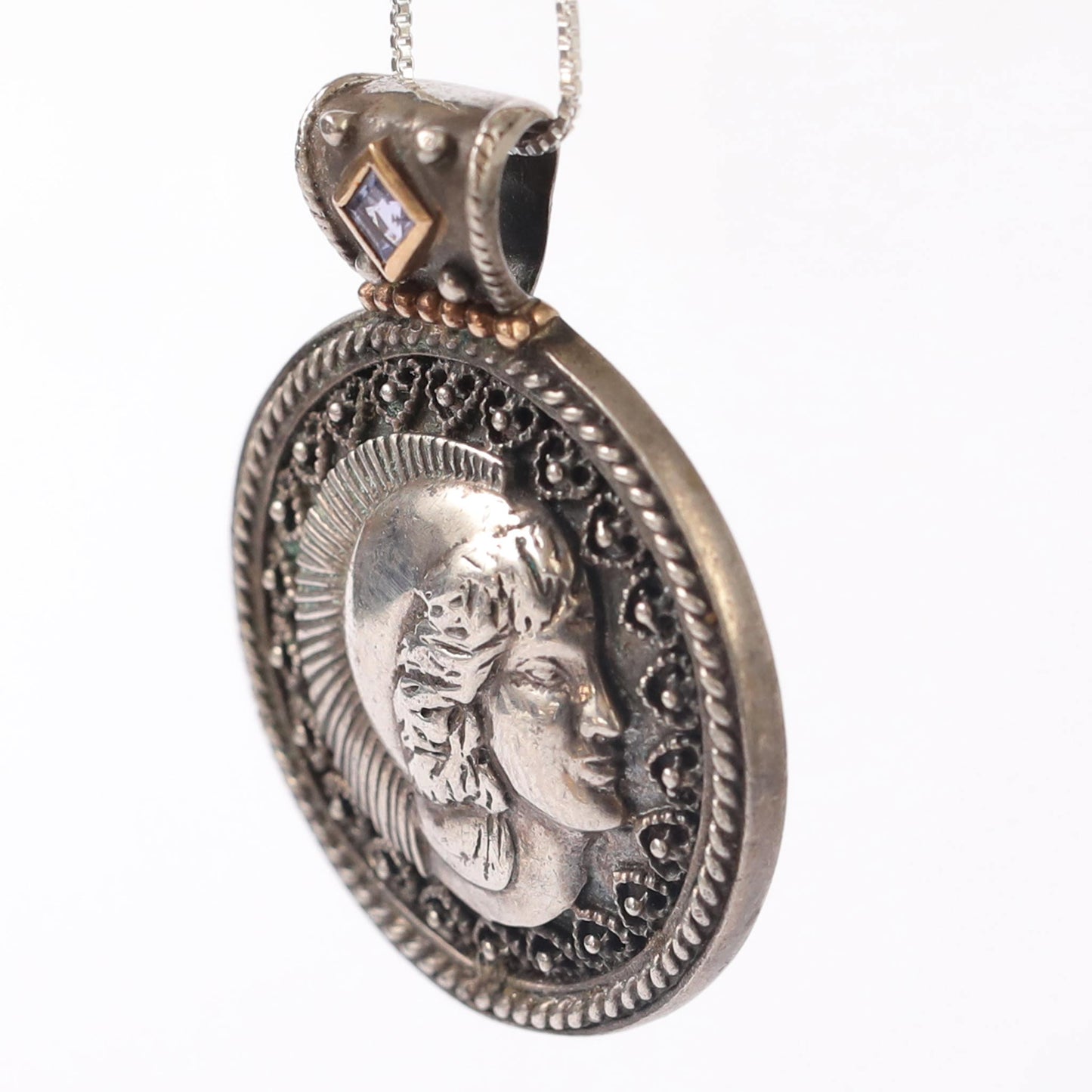 silver and touch of gold Roman coins pendant with amethyst stone