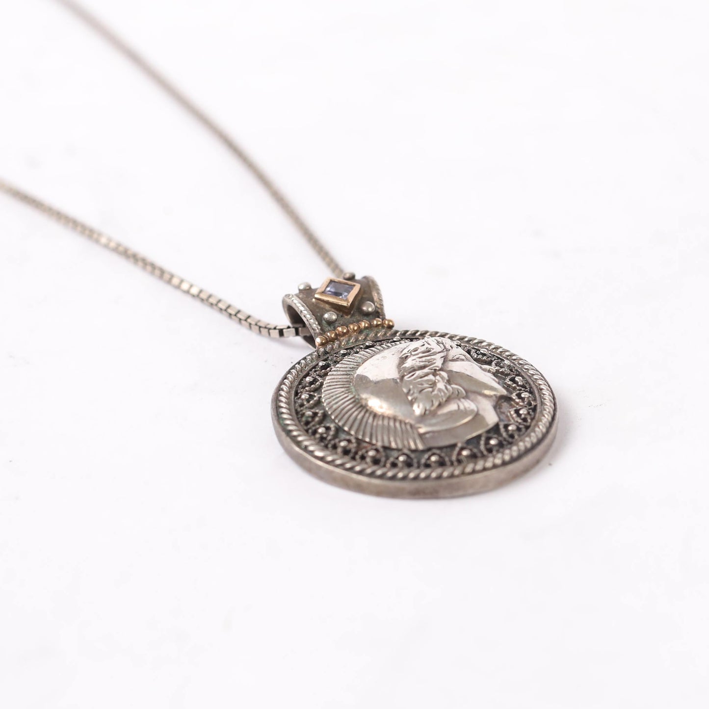 silver and touch of gold Roman coins pendant with amethyst stone